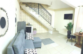 Appartement Meublé Yaoundé Éleveur - bordure de route